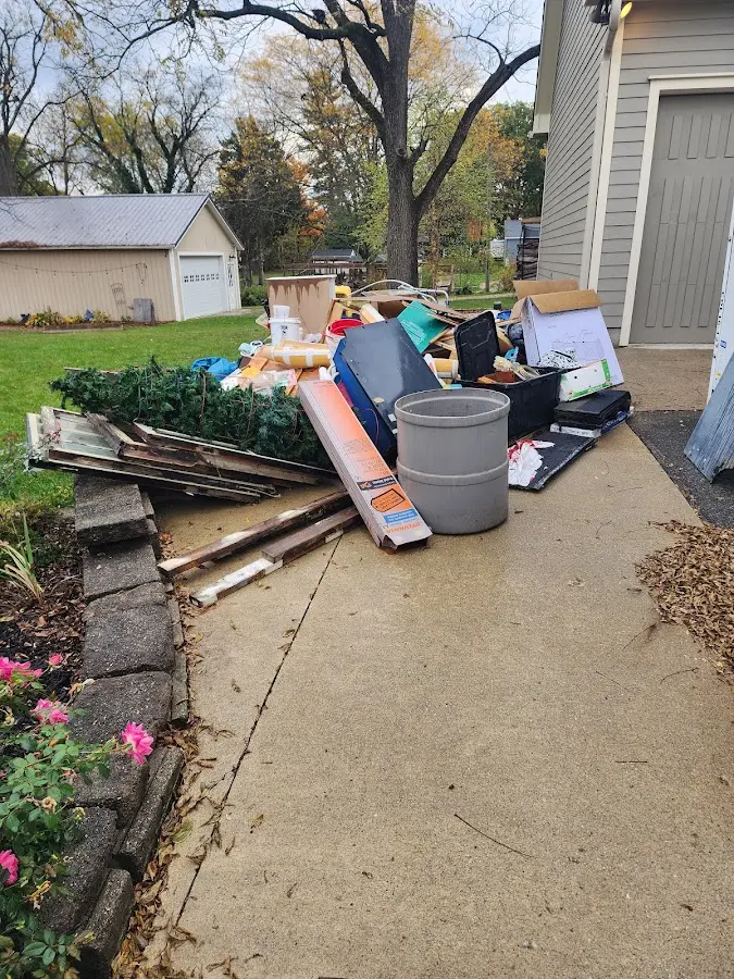 Dumpster being loaded with debris for 30 Yard Dumpster Rental in Peterborough